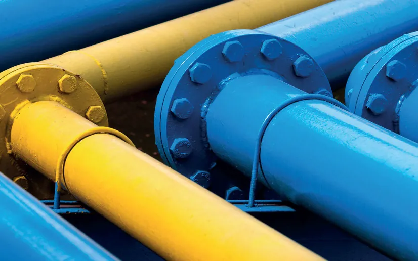 Industrial pipework coated in yellow and blue Ritver industrial finishes