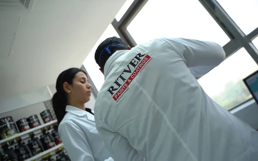 Ritver quality control technicians inspecting samples