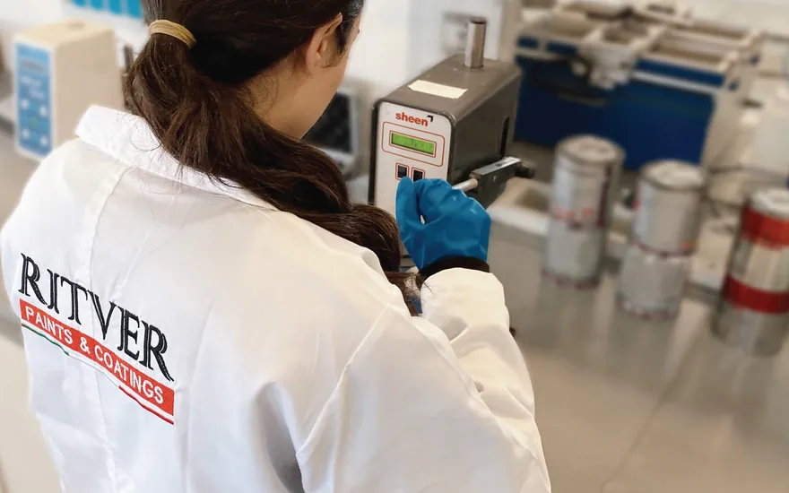 Ritver researcher testing a paint sample in the laboratory